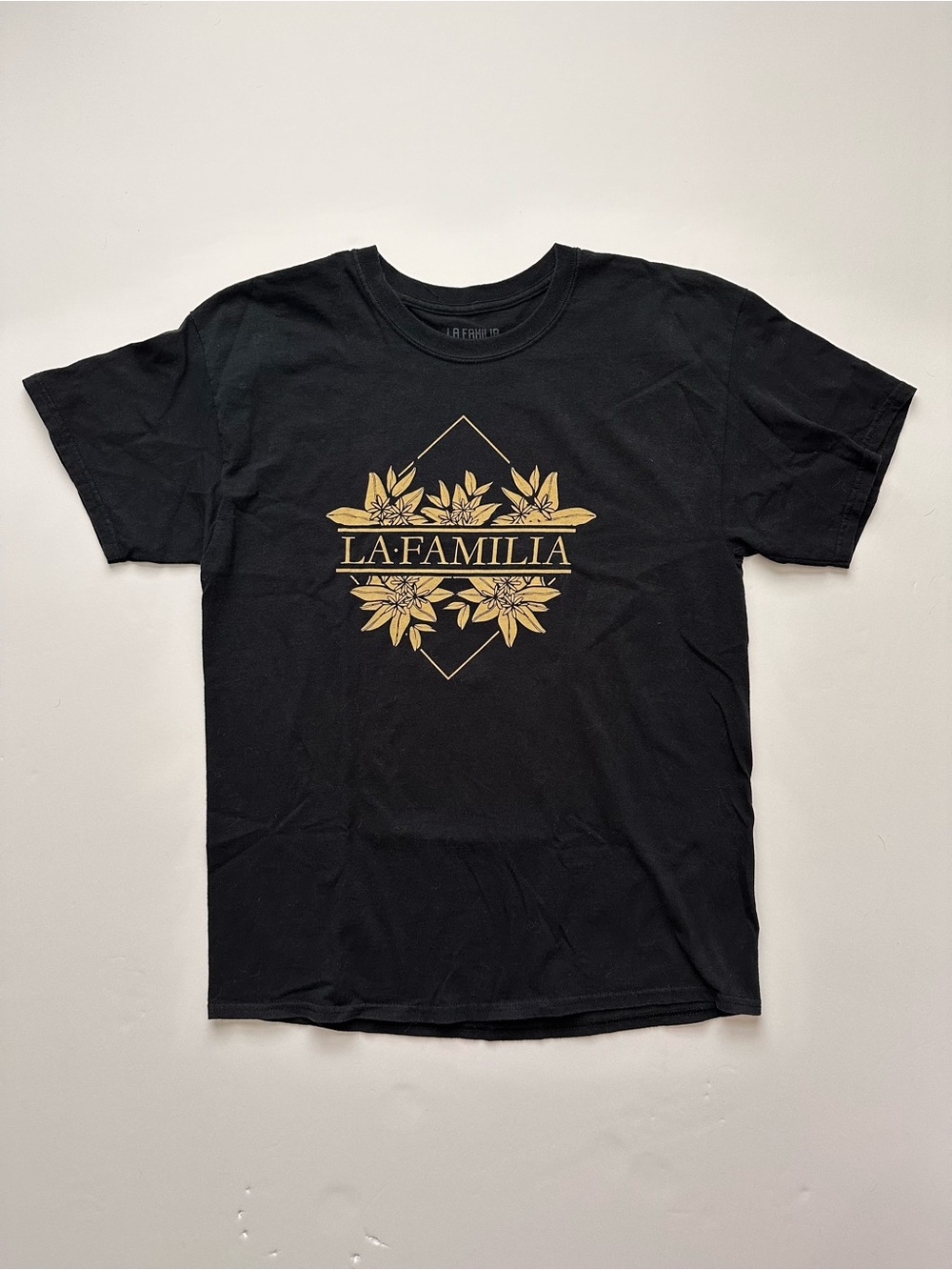 La Familia Black Short Sleeve Tee with Gold Floral Print